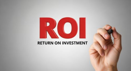 Ed Neir Construction helps his clients with home improvement recommendations that boost ROI - this image is of a hand with a pen and the words Return on investment.